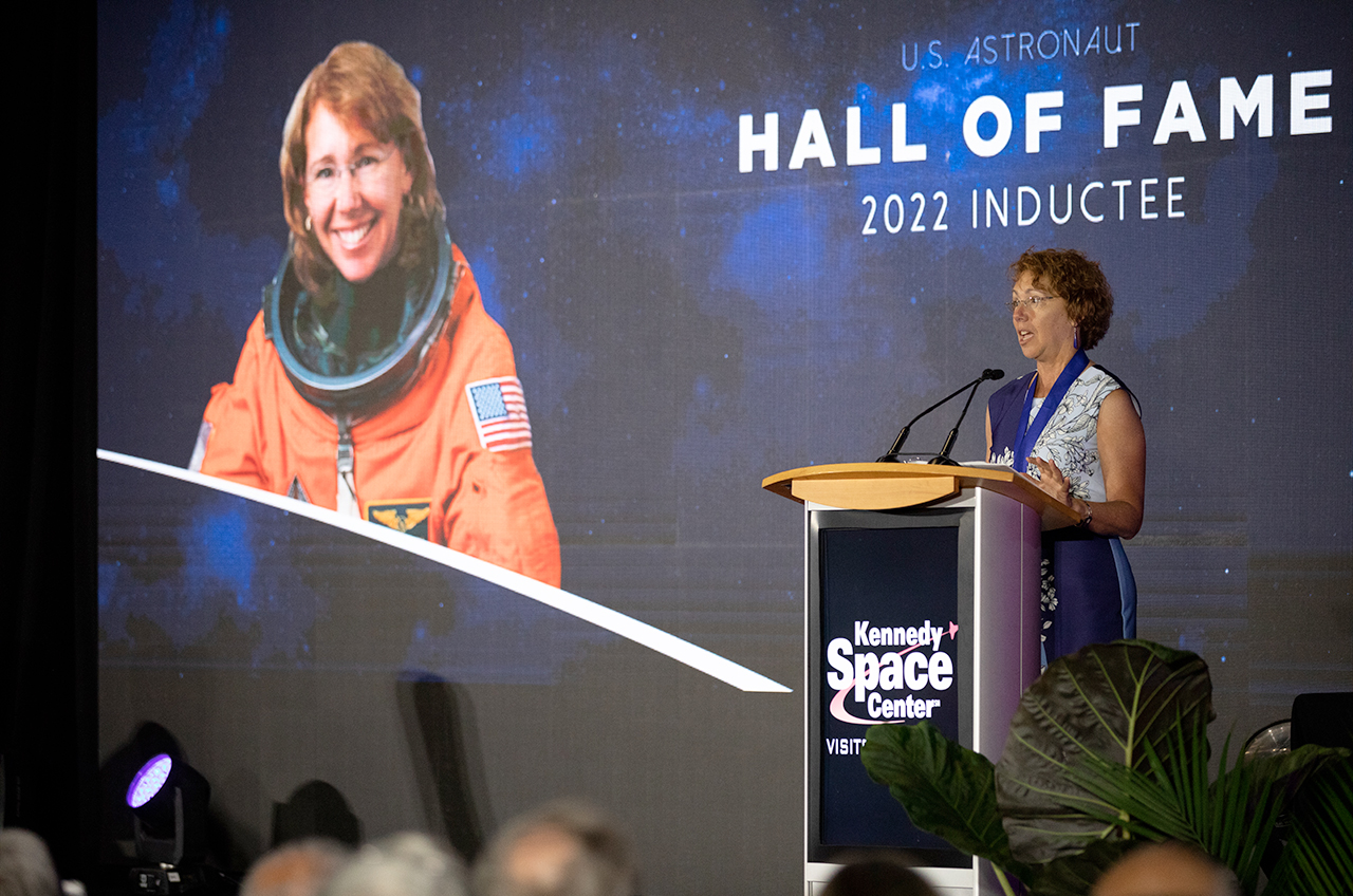 Sandy Magnus, who flew three times to space including on a long-duration stay on the International Space Station, enters the U.S. Astronaut of Fame during a ceremony held at the Kennedy Space Center Visitor Complex on June 11, 2022.
