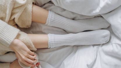Why you should sleep with socks on, sleep & wellness tips