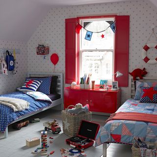 children bedroom with star wallpaper and pink window