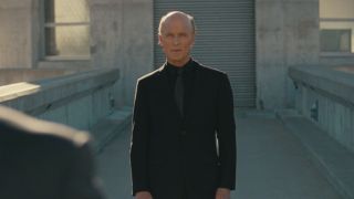 Man in Black standing at Hoover Dam in Westworld