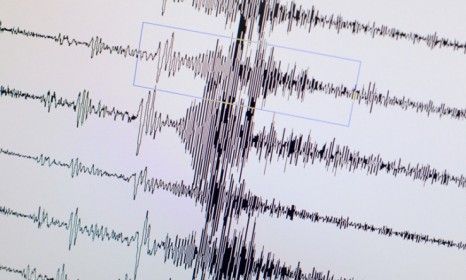 A geoscience monitor shows the curve of the earthquake that hit Japan, the fifth strongest quake ever recorded.