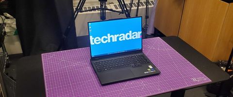 Lenovo Legion Pro 5i laptop on a purple tablemat