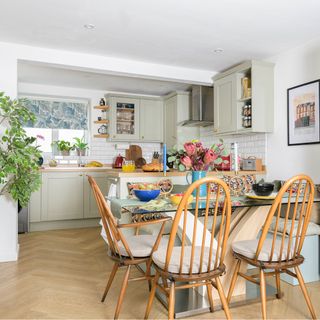 kitchen diner with glass dining table and chairs