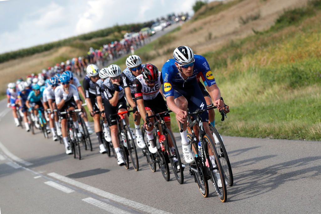 CHELM POLAND AUGUST 09 Tim Declercq of Belgium and Team Deceuninck QuickStep leads The Peloton during the 78th Tour de Pologne 2021 Stage 1 a 216km stage from Lublin to Chem 212m TourdePologne TDP2021 UCIWT on August 09 2021 in Chelm Poland Photo by Bas CzerwinskiGetty Images