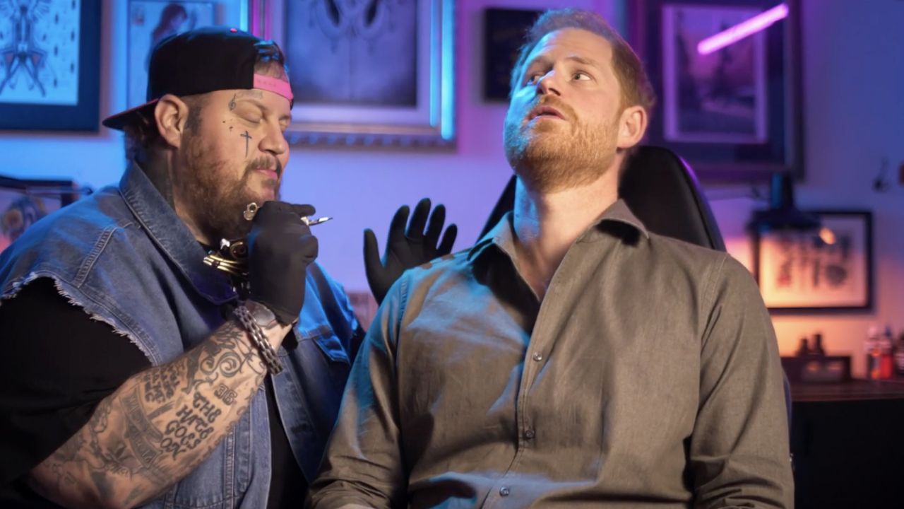 Prince Harry sitting in a chair getting a tattoo by Jelly Roll