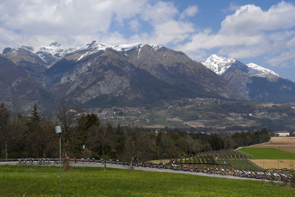 RIVA DEL GARDA ITALY APRIL 23 The Peloton during the 44th Tour of the Alps 2021 Stage 5 a 1209km stage from Valle del Chiese Idroland to Riva del Garda Landscape Mountains Snow TourofTheAlps TouroftheAlps on April 23 2021 in Riva del Garda Italy Photo by Tim de WaeleGetty Images