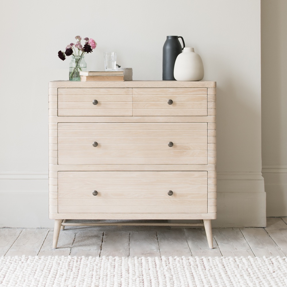 Groover chest of drawers with ornaments on top
