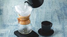 How to make pour-over coffee using the Chemex pour-over coffee maker with a gooseneck kettle pouring water into it