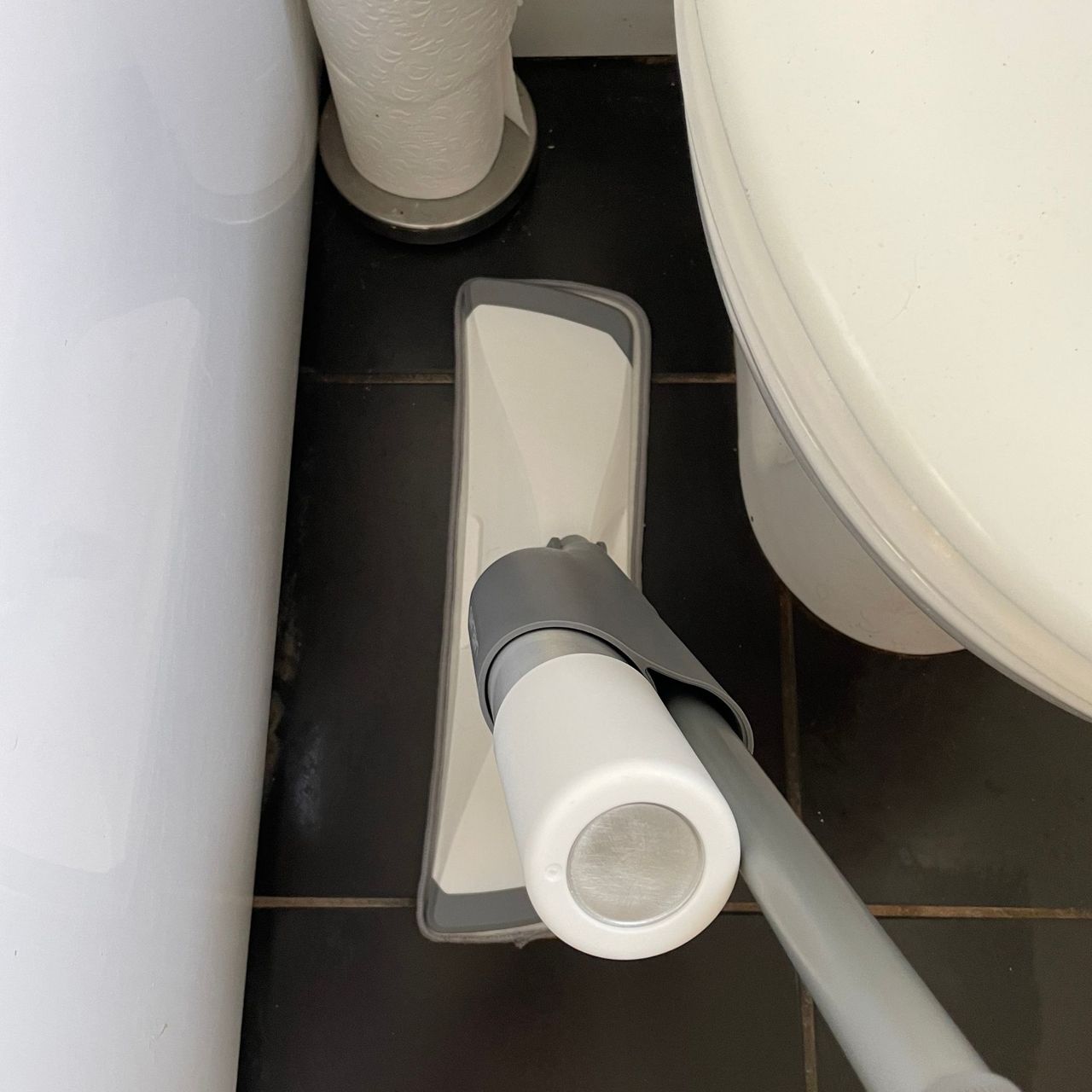 Using the Lakeland Spray Mop with 2 Aluminium Bottles down the side of a toilet