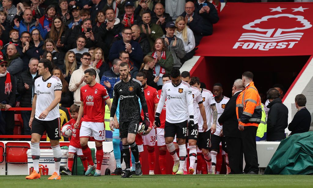 Manchester United players walk out ahead of the Premier League match with Nottingham Forest at City Ground