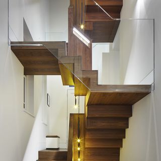 staircase with glass handrail