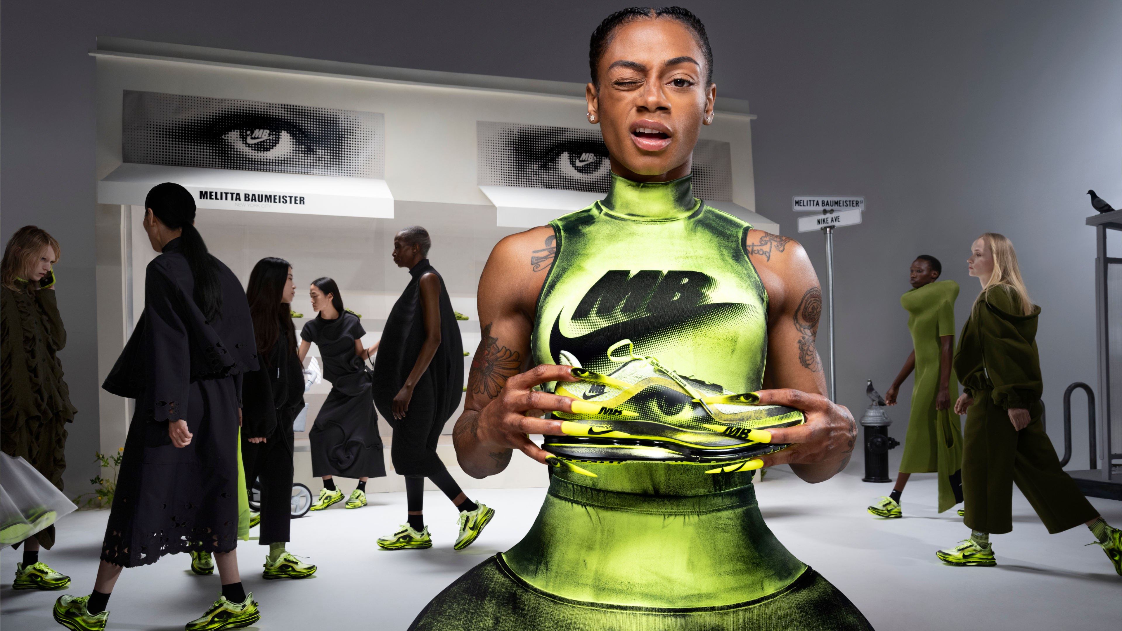 Sha&rsquo;Carri Richardson modeling melitta baumeister nike running sneakers