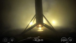 The first stage of a SpaceX Falcon 9 rocket rests on the deck of a drone ship shortly after launching 24 Starlink satellites from Vandenberg Space Force Base in California on Sept. 26, 2025.