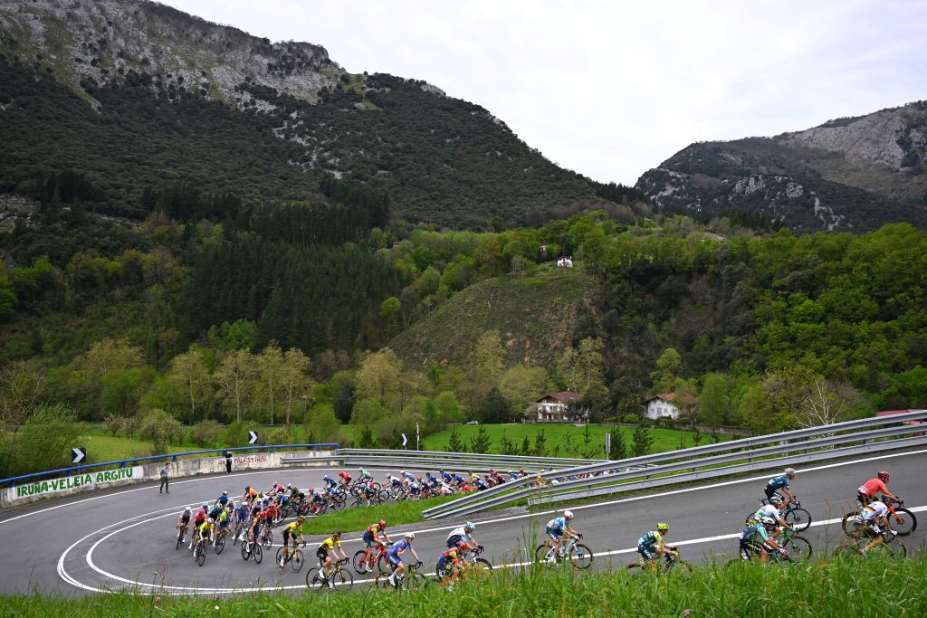 AMOREBIETA ETXANO SPAIN APRIL 05 LR Johannes StauneMittet of Norway and Team Visma Lease a Bike Bauke Mollema of The Netherlands and Team Lidl Trek Juri Hollmann of Germany and Team Alpecin Deceuninck Andrea Bagioli of Italy and Team Lidl Trek and a general view of the peloton climbing to Urkiola 754m during the 63rd Itzulia Basque Country 2024 Stage 5 a 1759km stage from VitoriaGasteiz to AmorebietaEtxano UCIWT on April 05 2024 in AmorebietaEtxano Spain Photo by Tim de WaeleGetty Images
