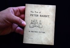 A first edition of The Tale of Peter Rabbit by Beatrix Potter, which came up at Dreweatts and Bloomsbury Auctions in 2016. Photo by Carl Court/Getty Images.