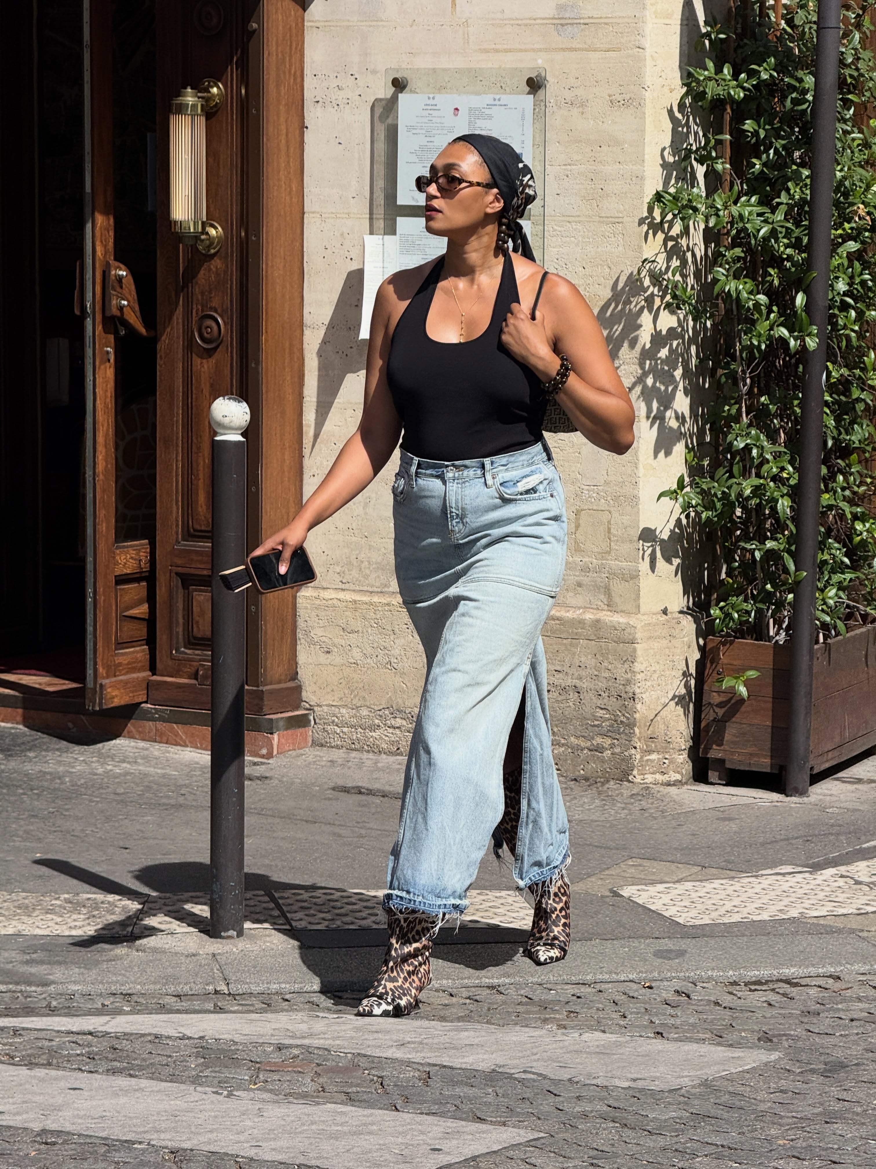 A woman wearing fall boot trend with jeans in 2026.