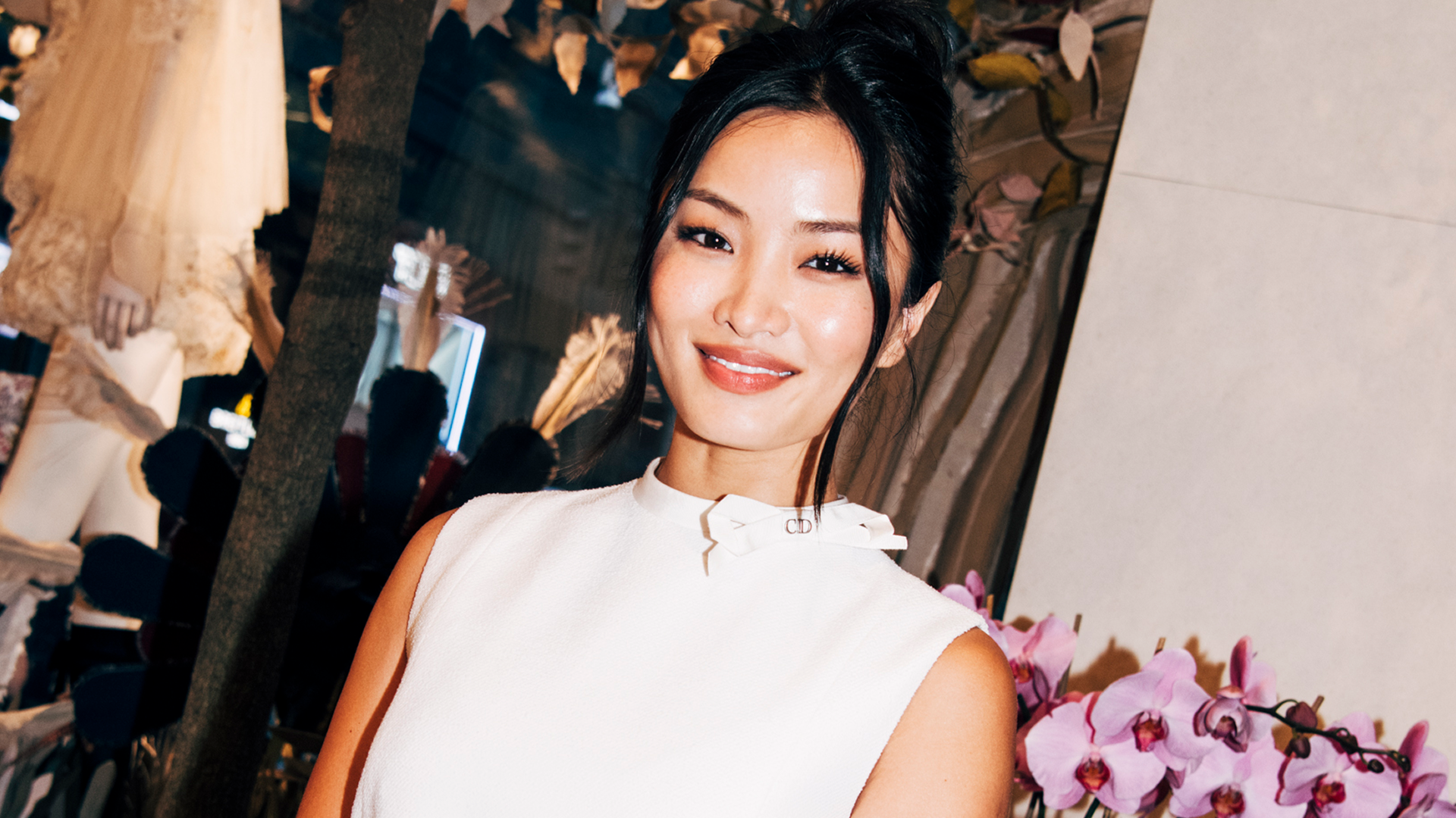 Anna Sawai attended a Dior event at NYFW in a little white dress and a Lady Dior handbag