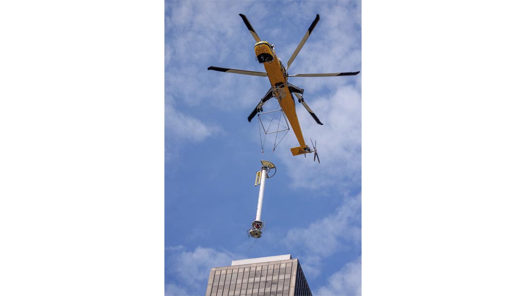 Lifting the new Dielectric Antennas into place involved closing more than a dozen city streets and was one of the project&rsquo;s most demanding aspects. 
