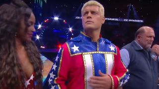 Cody Rhodes with his wife, Brandi Rhodes, on his right, and Arn Anderson on his left in AEW