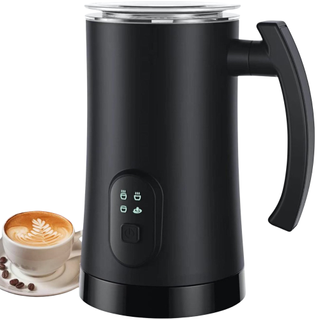 A black Electric Milk Frother from Amazon pictured with a cup of coffee