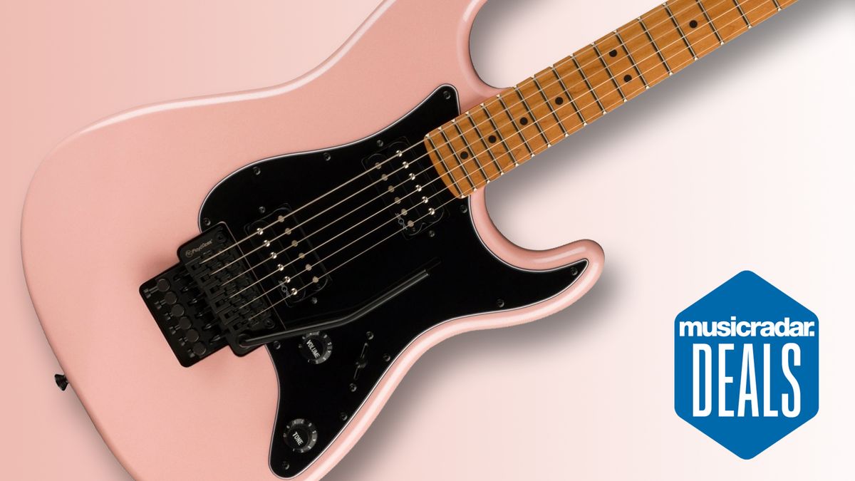 Pink Fender guitar on a pink background