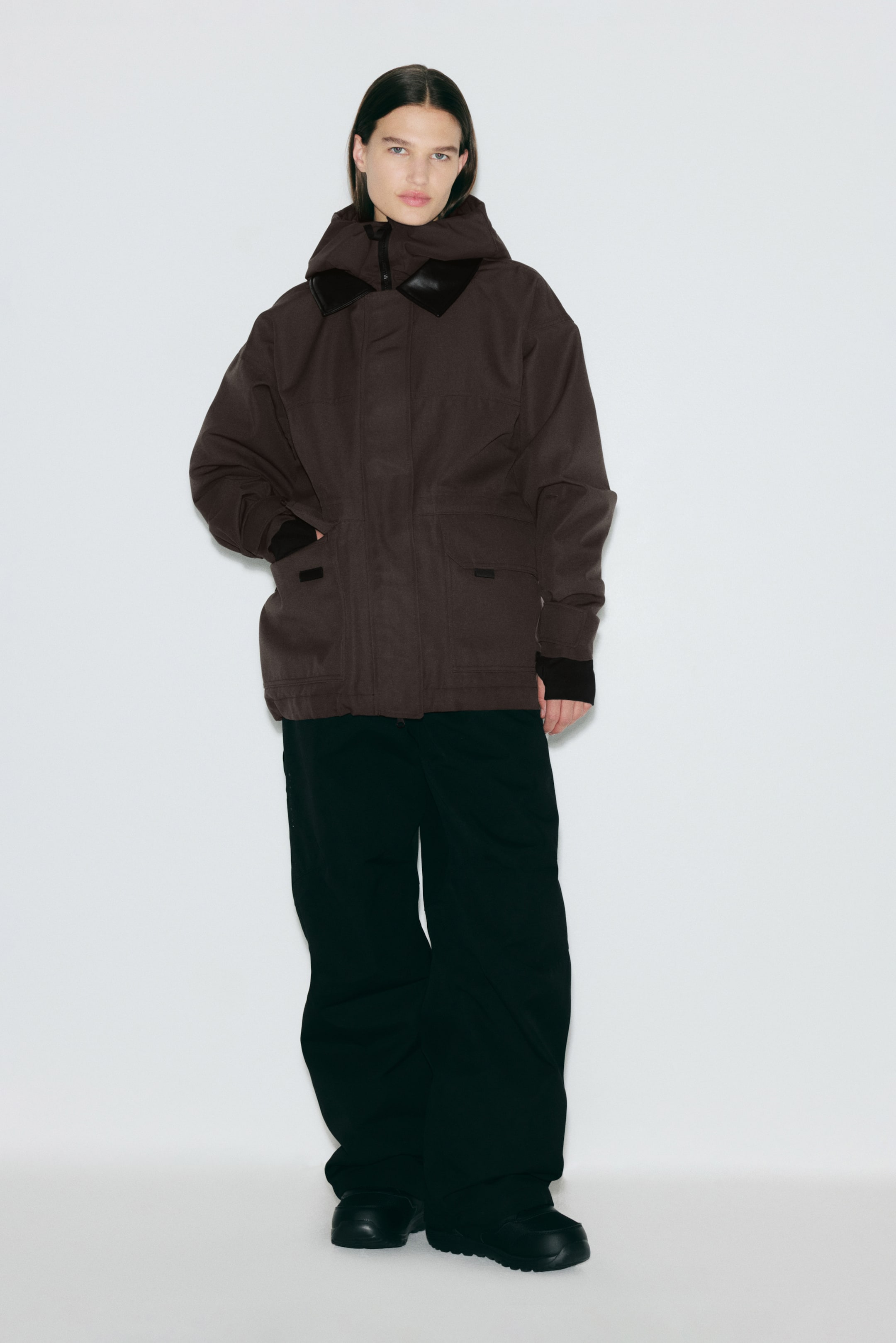 a model wearing an H&amp;amp;M brown ski jacket