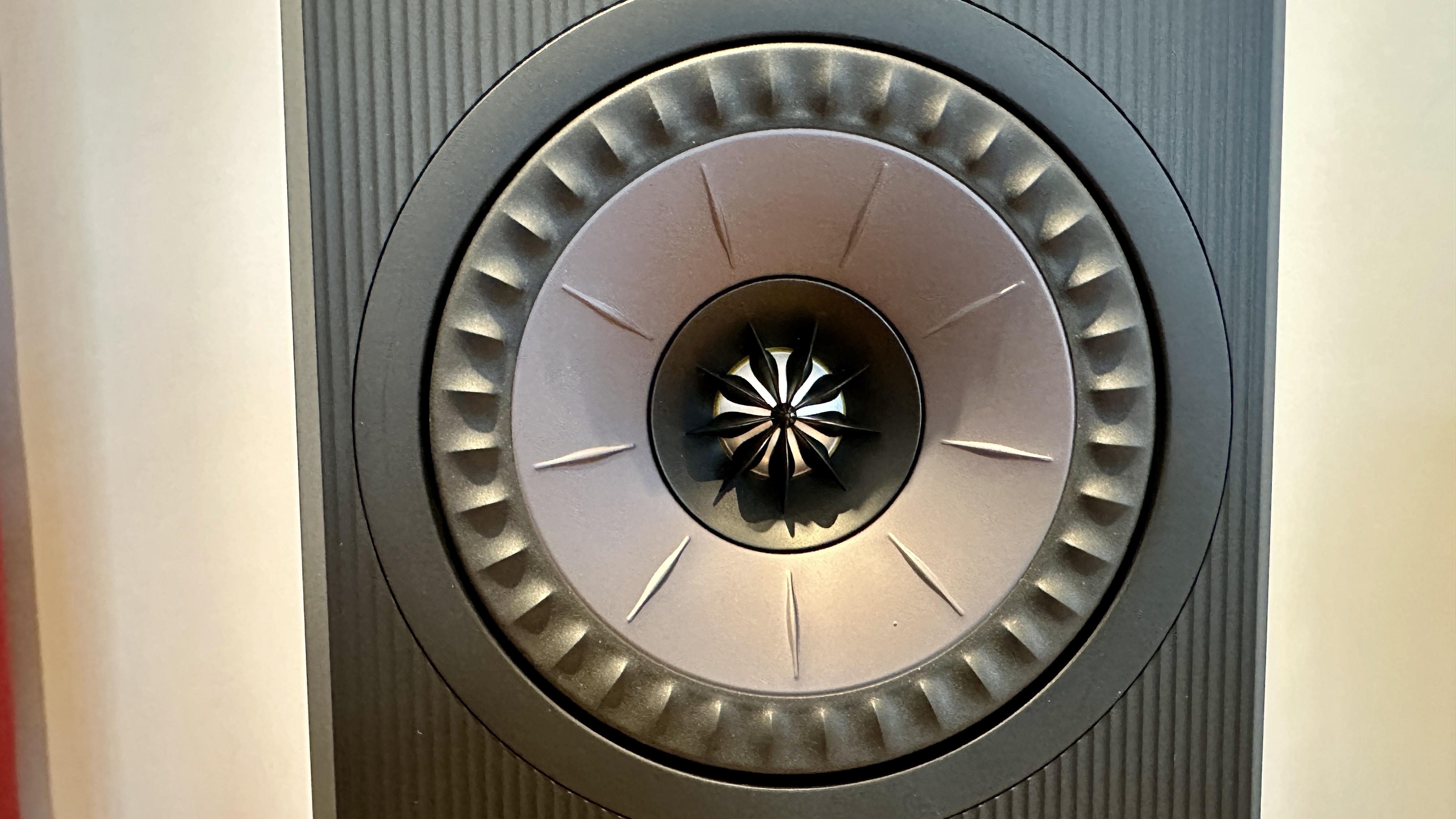 Closeup of the drivers of the KEF Coda W active speaker system.