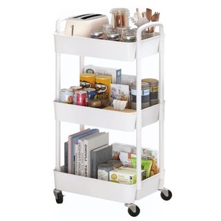 A white kitchen trolley with snacks inside