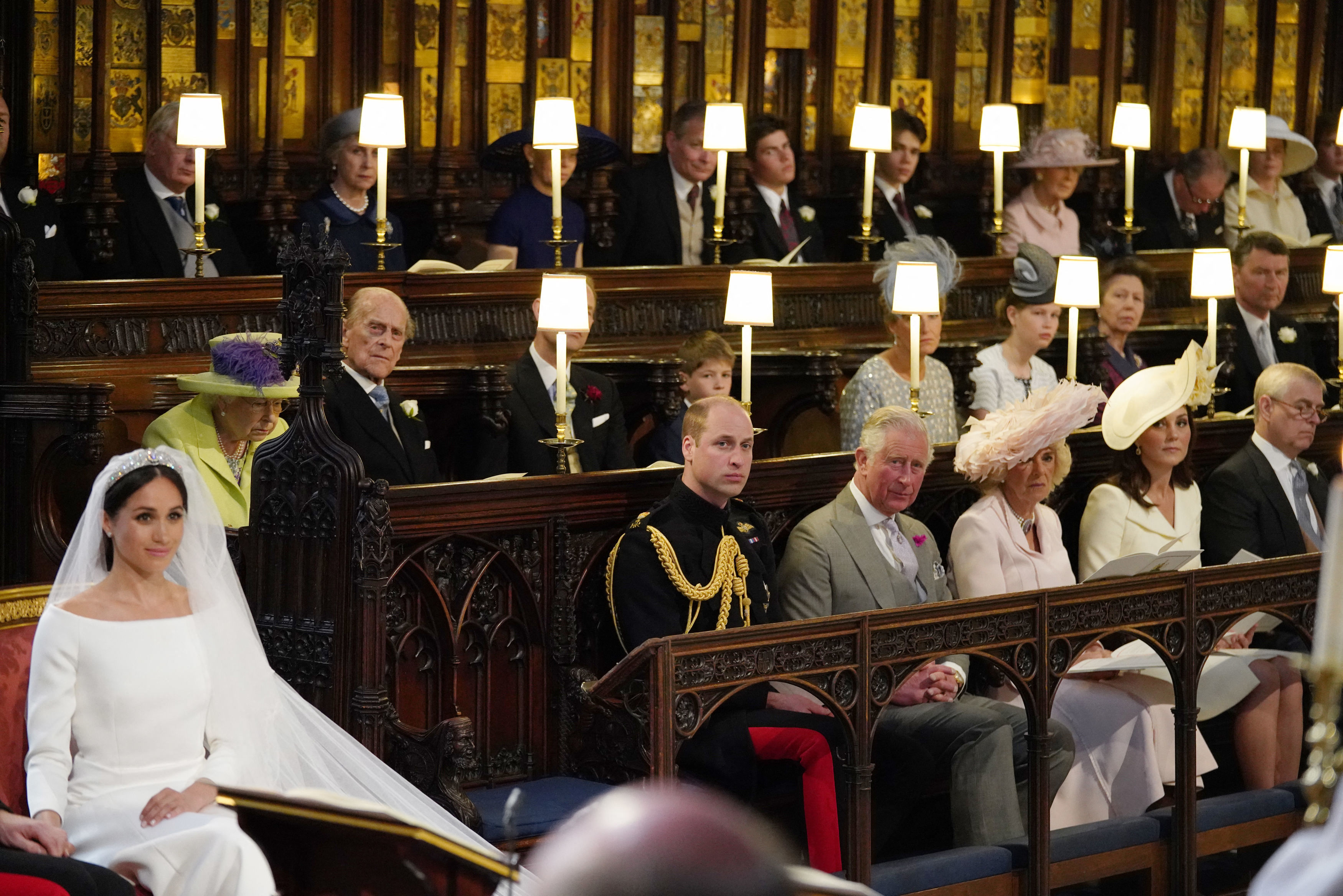 Queen Elizabeth wears a lime green outfit to attend Prince Harry and Meghan Markle's royal wedding on May 19, 2018