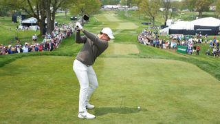 Rory McIlroy hitting a tee shot during a practice round ahead of the 2023 PGA Championship