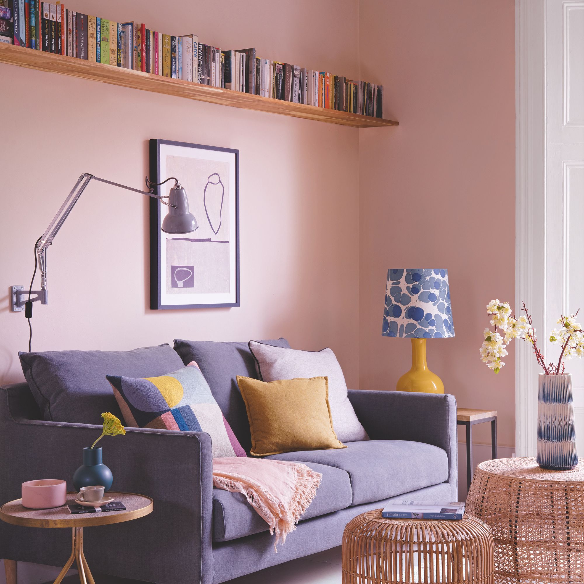 Pink living room scheme with mustard and blue accents