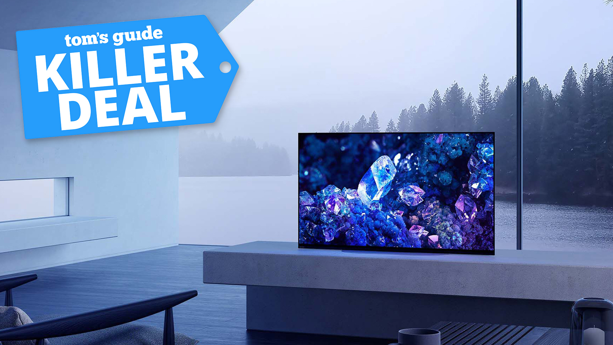 Lifestyle image showing the Sony Bravia XR A90K OLED TV on a bench in front of a window