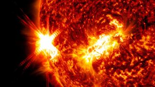 A powerful X1.9-class solar flare erupts from the sun in this image from NASA's Solar Dynamics Observatory captured on Jan. 9, 2022.