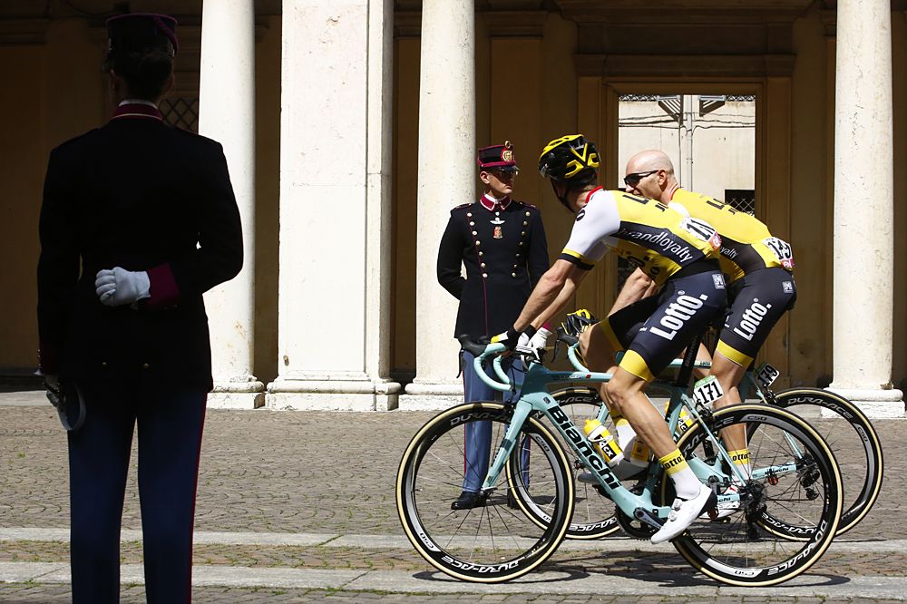 Riders of team Lotto NL Jumbo pass in the court of the military academy of Modena before the start of the 11th stage of the 99th Giro d'Italia