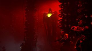 Key art for Marathon shows a squad of players in a red-lit room hiding in the shadows of data towers from an ominous, tall, floating red robot thing