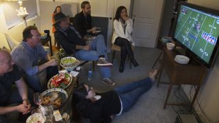 Fans watch Super Bowl on TV