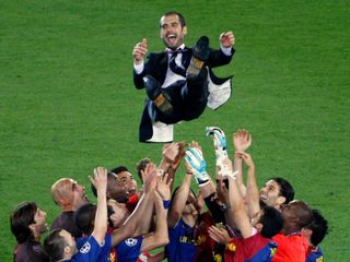 Barcelona players throw Pep Guardiola in the air after winning the 2009 Champions League final against Manchester United