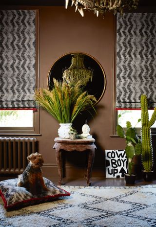 living room with brown scheme and boho features by abigail ahern
