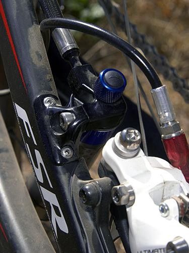A neat riveted-on mount secures the rear Brain unit