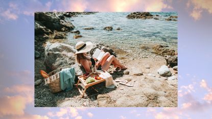 Woman sitting reading on beach