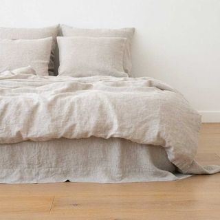 washed linen bedding in neutral to support the quiet luxury trend for interiors