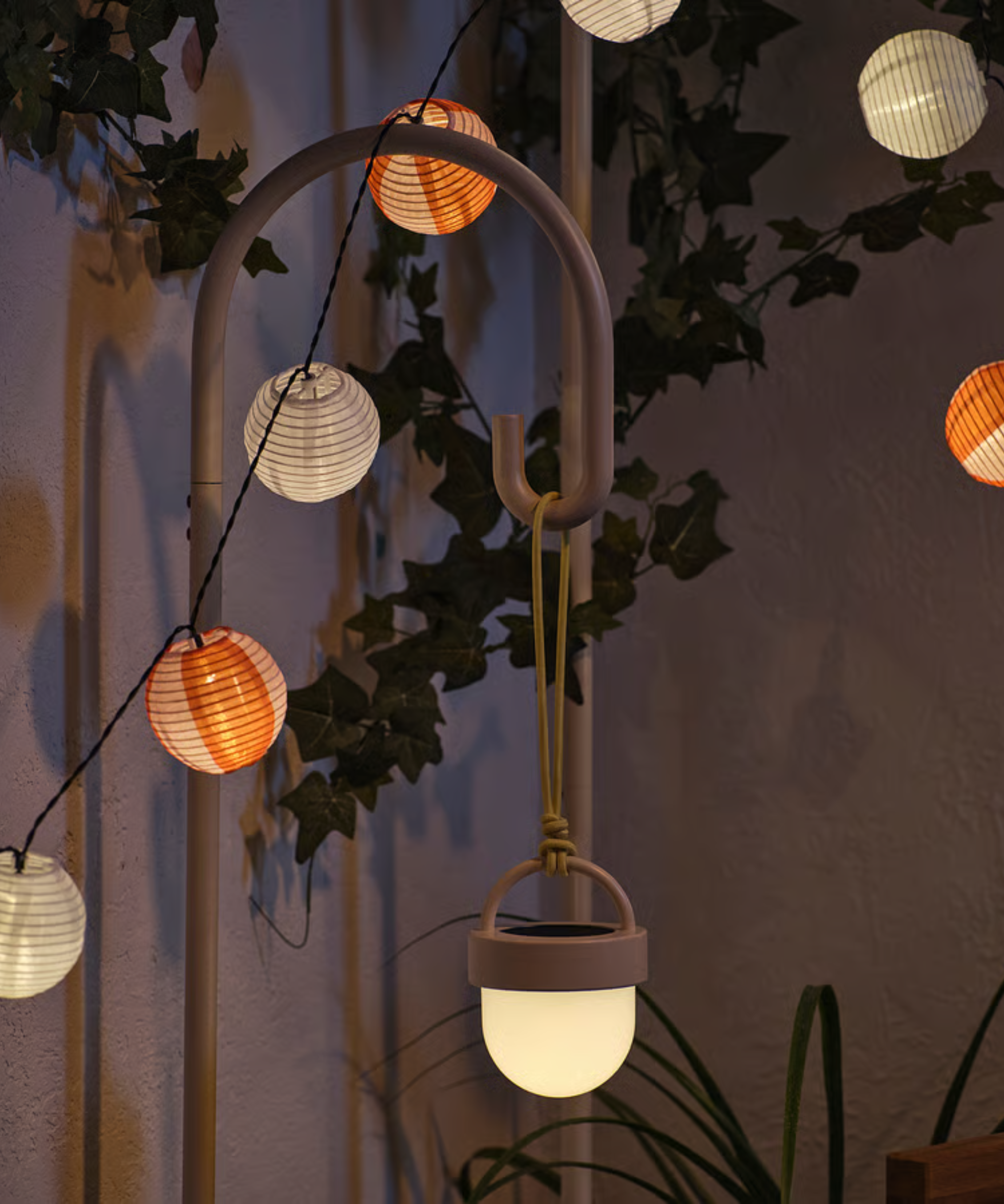 IKEA's Solvinden pendant lamp hanging from a lamp hook