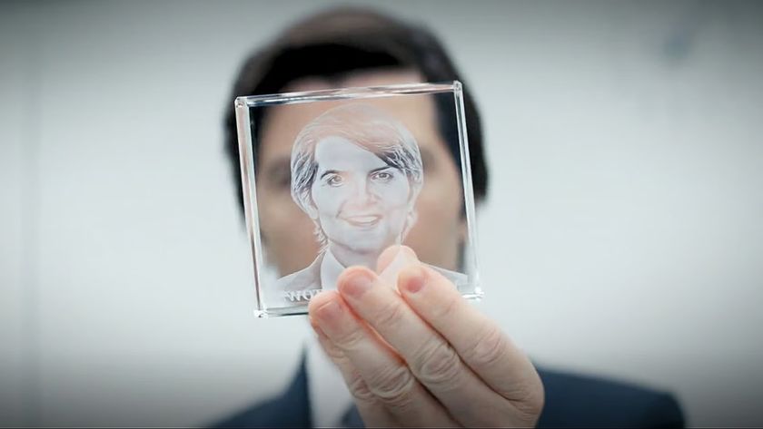Mark looks at a crystal cube from Lumon in Severance