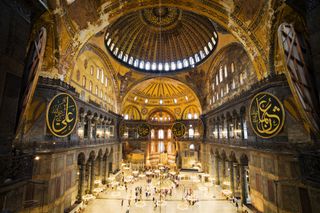 Interior of the Hagia Sophia in Istanbul, Turkey. The crown of the dome rises 180 feet (55 meters) above the floor.