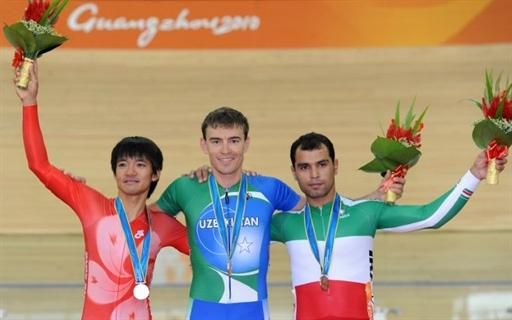 Men's points race podium (l-r): Kam Po Wong (Hong Kong, China), 2nd; Vladimir Tuychiev (Uzbekistan), 1st; Mehdi Sohrabi (Iran), 3rd.