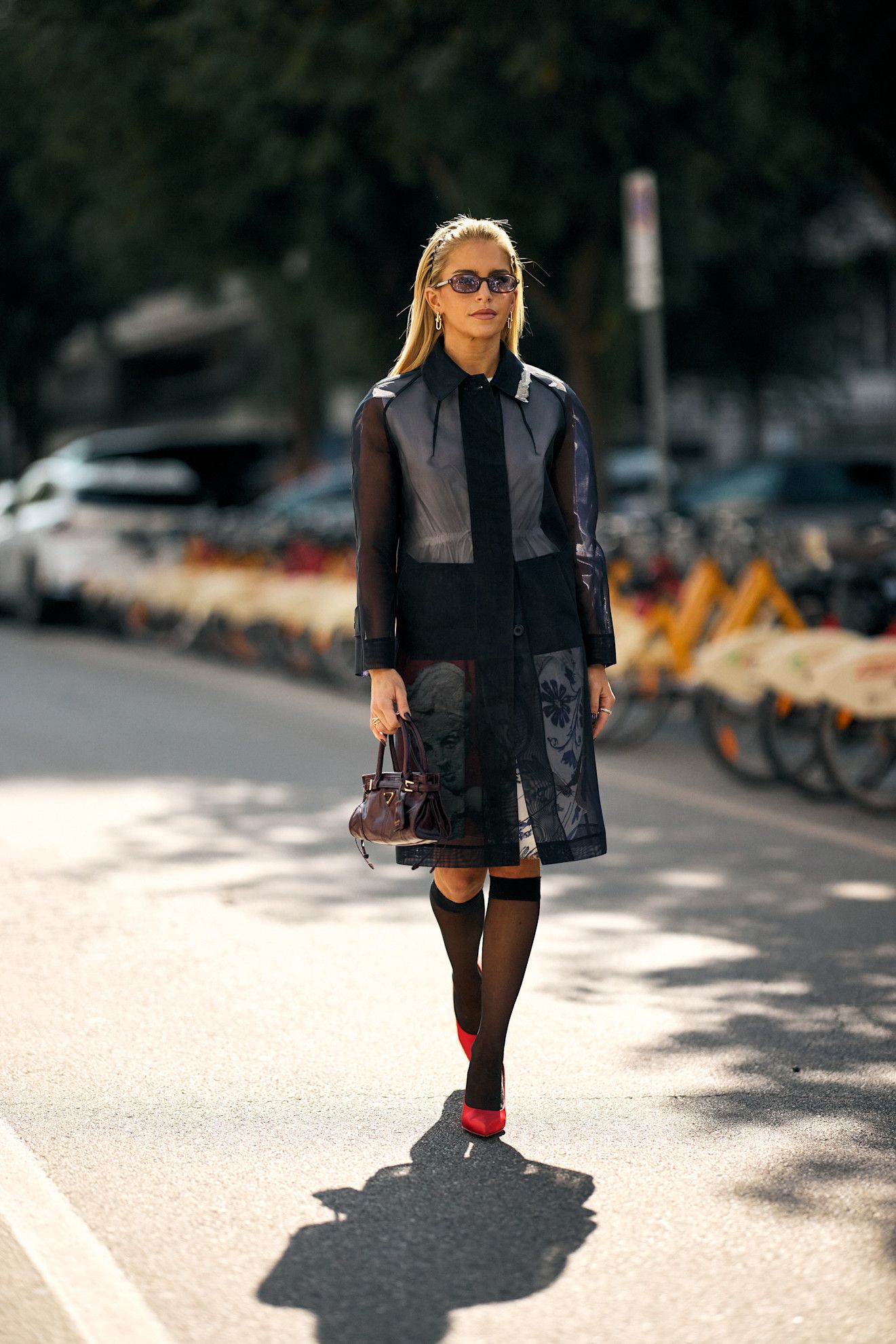 woman wearing sheer coat