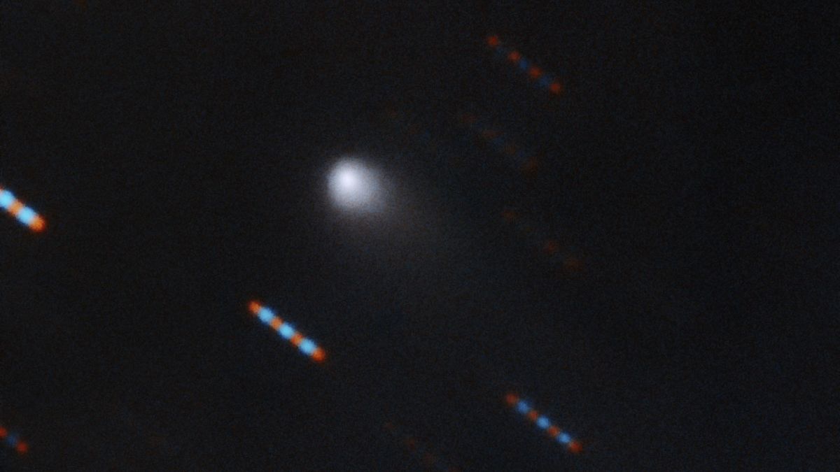 The first color image of the comet C/2019 Q4 (Borisov), which astronomers believe to be the first known interstellar comet ever identified, was captured by the Gemini North telescope at Hawaii&#039;s Mauna Kea. Gemini North acquired four 60-second exposures in two color bands (red and green). The blue and red lines are background stars moving in the background.