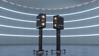 Monitor Audio Studio 89 bookshelf speakers with stands in stylised lightroom