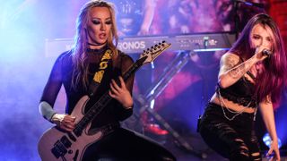  Nita Strauss (L) and Kasey Karlsen perform on stage during the opening night of 'The Summer Storm' tour at EXIT/IN on June 13, 2023 in Nashville, Tennessee