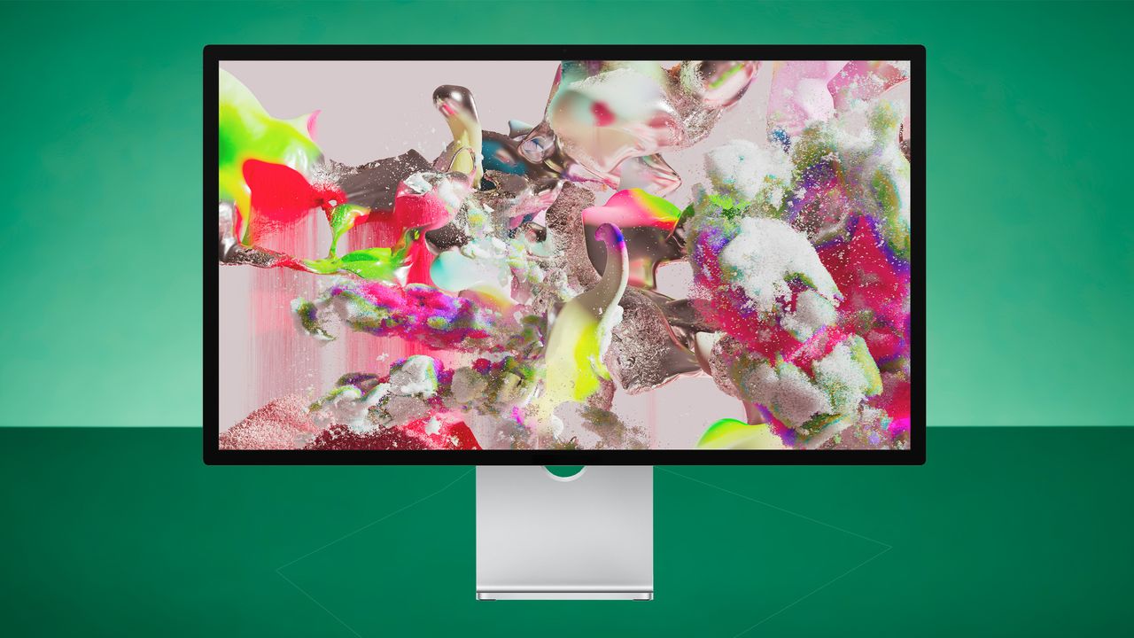 Apple Studio Display on green background